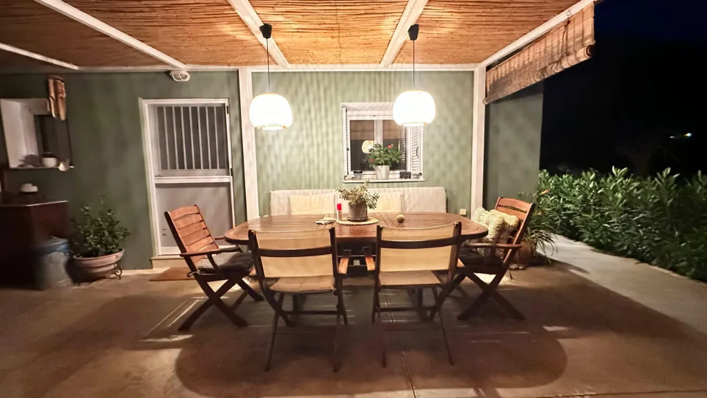 Dinner outdoors, looking over the garden